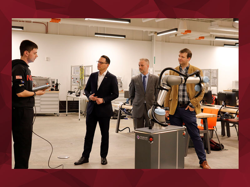 CCAC Mechatronics student Patrick Fox demonstrates robotics technology with Governor Shapiro (center) and Michael Rinsem CCAC Endowed Professor, Technical Curriculum (left) and Dr. Justin Starr, CCAC Endowed Professor, Advanced Technologies.