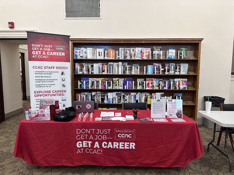 An information table offers a wealth of resources about getting a career at CCAC. 