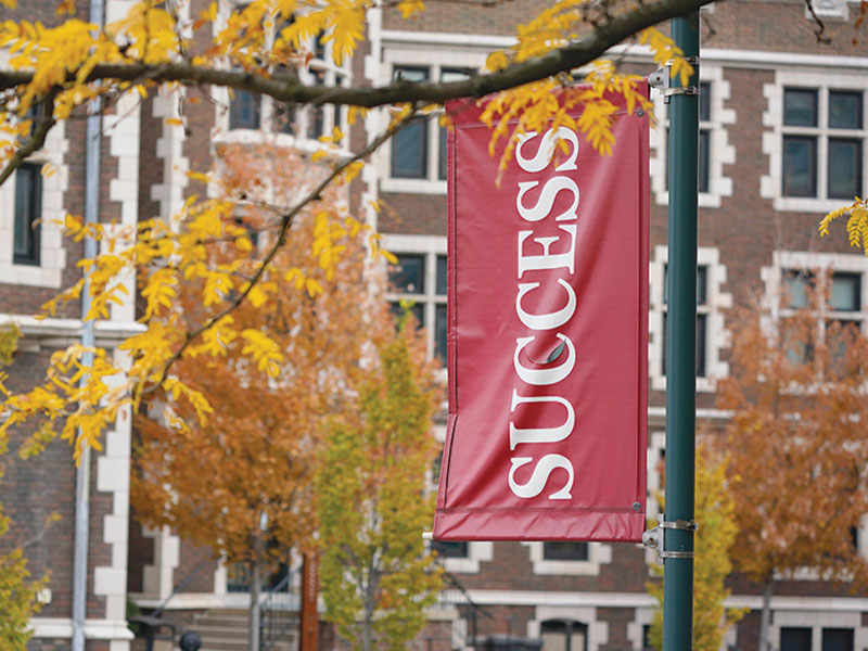 CCAC Success flag on a pole, at Allegheny Campus