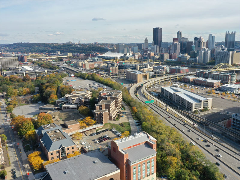 An aerial view of CCAC’s Allegheny Campus with Pittsburgh’s Downtown on the horizon.