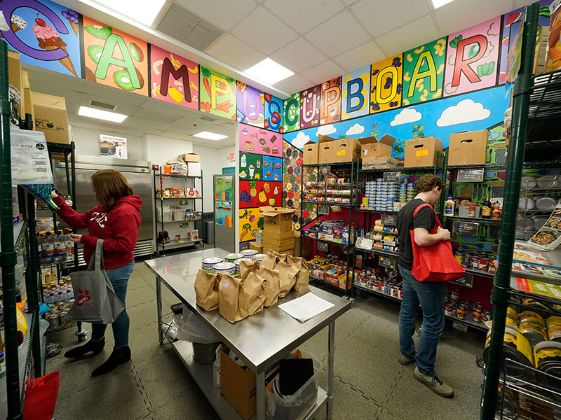 Students browse the shelves of the Campus Cupboard food pantry on CCAC's South Campus.