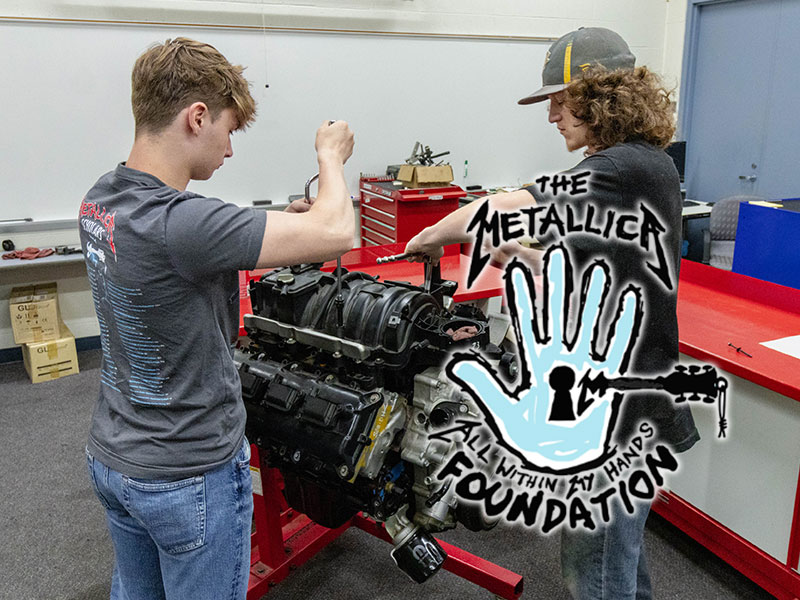 Local high school students enrolled in the CCAC Skilled Trades Academy work with a CCAC instructor on automotive repair at the college's West Hills Center.