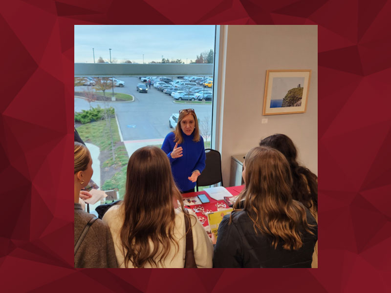 Jo Ann Hunter, CCAC Business and Accounting Professor, meets with students during the PICPA Accounting Career Day at Robert Morris University.