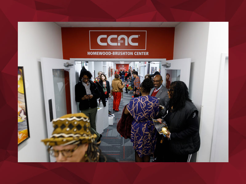 CCAC President, Dr. Quintin Bullock, mingles with guests at the recent CCAC Homewood-Brushton Center celebration.