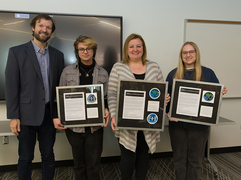 Parkway West CTC student artists were honored during a CCAC Space Day Awards presentation. Pictured (left to right) Dr. Justin Starr, CCAC Endowed Professor of Advanced Technologies; Parkway West CTC graduate, Joey Clark; Betsy Zelina, Parkway CTC Graphics Design and Production instructor; Parkway West CTC student Reagan Zatezalo.